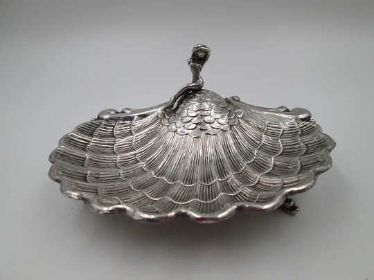 Almond shell dish. Sterling silver. Mermaid and scale motifs. Fish shaped legs. 1970's