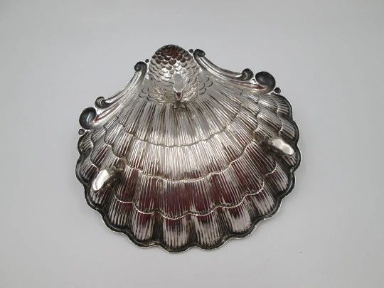 Almond shell dish. Sterling silver. Mermaid and scale motifs. Fish shaped legs. 1970's