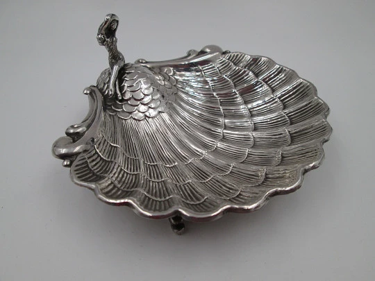 Almond shell dish. Sterling silver. Mermaid and scale motifs. Fish shaped legs. 1970's