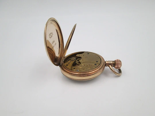 American Waltham open-face pocket watch. Gold plated. Stem-wind. Porcelain dial. 1910's