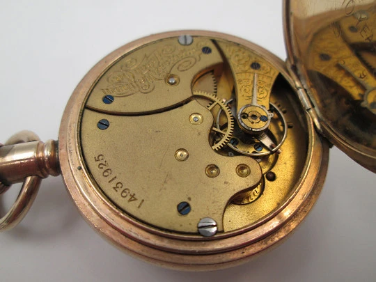 American Waltham open-face pocket watch. Gold plated. Stem-wind. Porcelain dial. 1910's