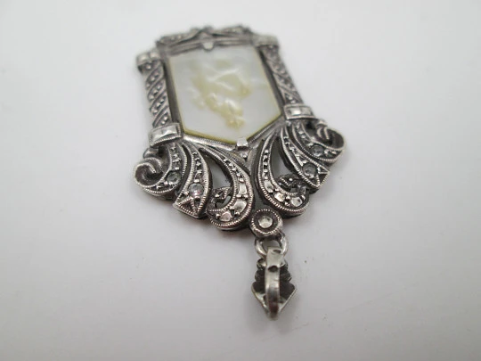 Art Deco pendant medal with mother-of-pearl Virgin in openwork chapel. Marcasites stones