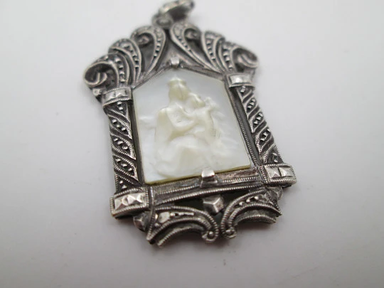 Art Deco pendant medal with mother-of-pearl Virgin in openwork chapel. Marcasites stones