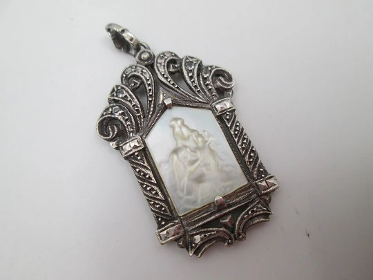 Art Deco pendant medal with mother-of-pearl Virgin in openwork chapel. Marcasites stones