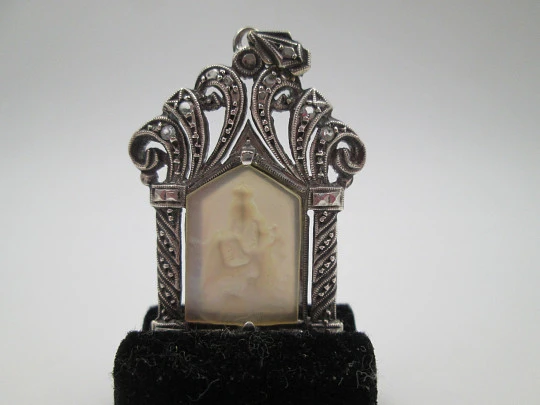 Art Deco pendant medal with mother-of-pearl Virgin in openwork chapel. Marcasites stones