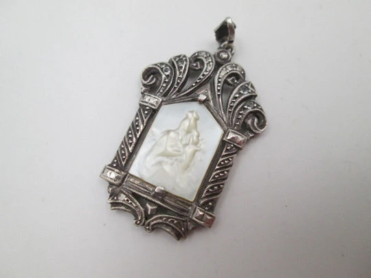 Art Deco pendant medal with mother-of-pearl Virgin in openwork chapel. Marcasites stones