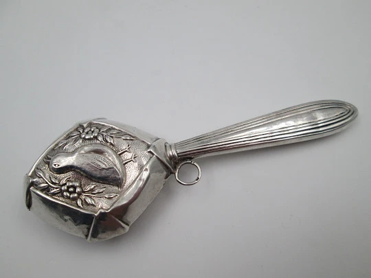 Baby rattle with handle. 835 sterling silver. Duck with flowers and leaves. Portugal. 1980's