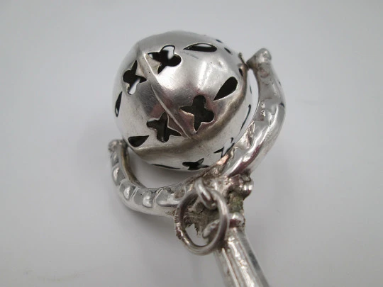 Baby rattle with handle. Sterling silver. Vegetable motifs. Openwork sphere. 1980's