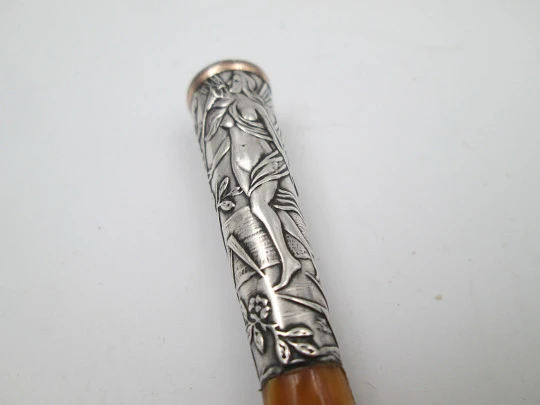 Cigarette mouthpiece. Sterling silver, amber and gold edge. River nymph. Europe. 1900's