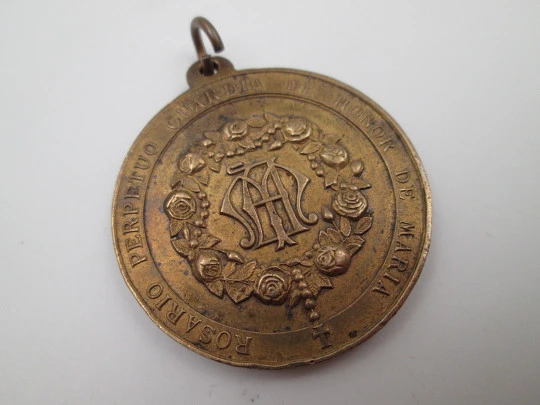 Copper medal. Queen of the Most Holy Rosary. Mary's Honor Guard. Ring on top. 1920's