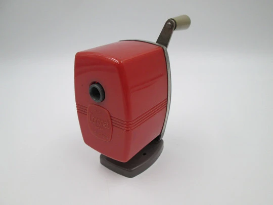 Coronet III (Velos) desk pencil sharpener. Red plastic and bitone metal. England. 1950's