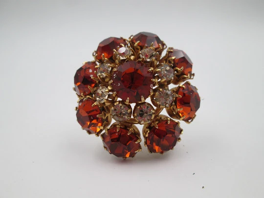 Dag women's brooch. Gold plated metal. White and orange rhinestones. USA. 1960's