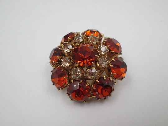 Dag women's brooch. Gold plated metal. White and orange rhinestones. USA. 1960's