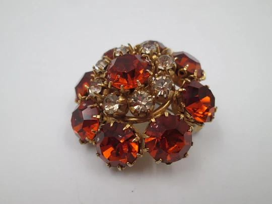 Dag women's brooch. Gold plated metal. White and orange rhinestones. USA. 1960's