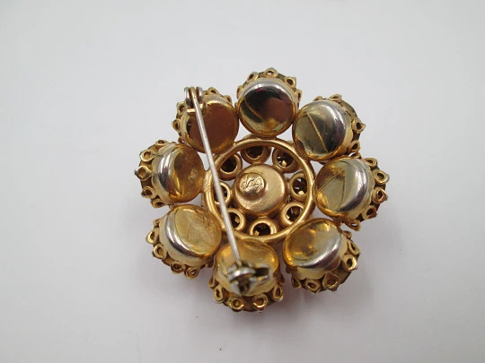 Dag women's brooch. Gold plated metal. White and orange rhinestones. USA. 1960's