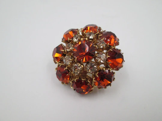 Dag women's brooch. Gold plated metal. White and orange rhinestones. USA. 1960's