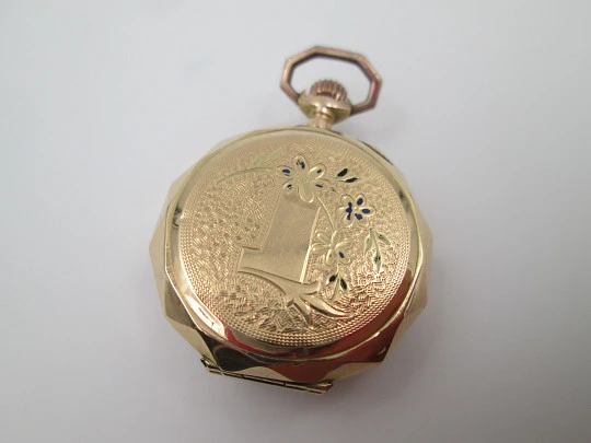 Decagonal pocket watch. 14k yellow gold. Stem-wind. Porcelain dial. Floral motifs. 1890