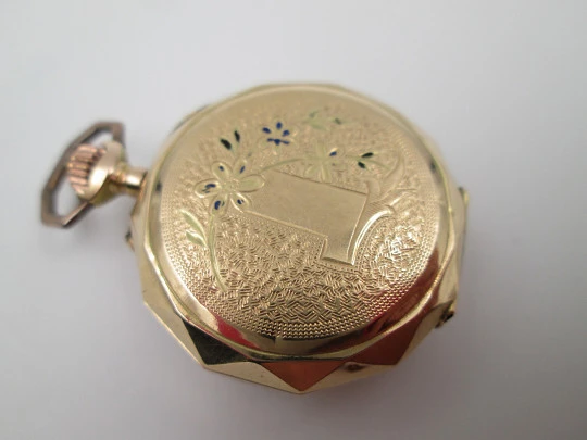 Decagonal pocket watch. 14k yellow gold. Stem-wind. Porcelain dial. Floral motifs. 1890