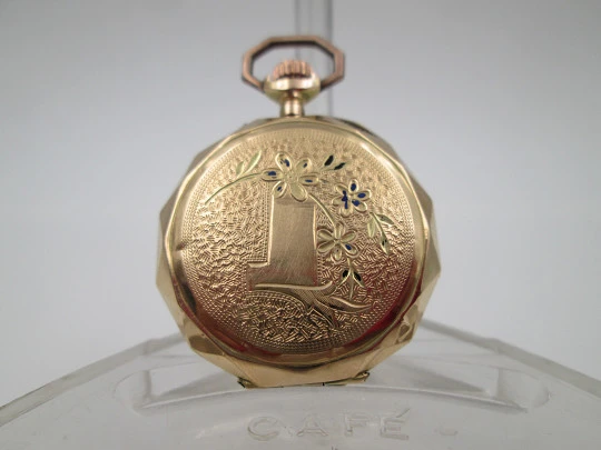 Decagonal pocket watch. 14k yellow gold. Stem-wind. Porcelain dial. Floral motifs. 1890