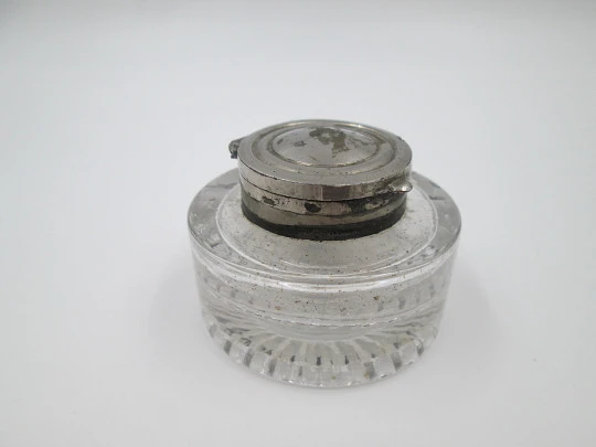 Desk carved crystal inkwell. Articulated silver plated lid. Sun motif. Europe. 1940's