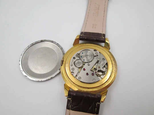 Dogma Prima. 10 microns gold plated & stainless steel. Manual wind. Swiss. 1950's