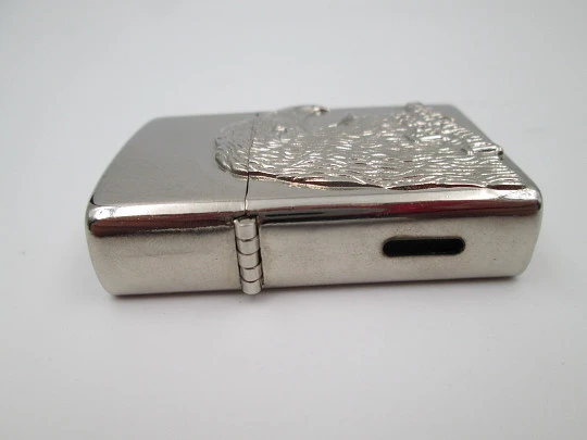 Eagle Double Flame butane torch pocket lighter with bird relief motif. Chromed plated