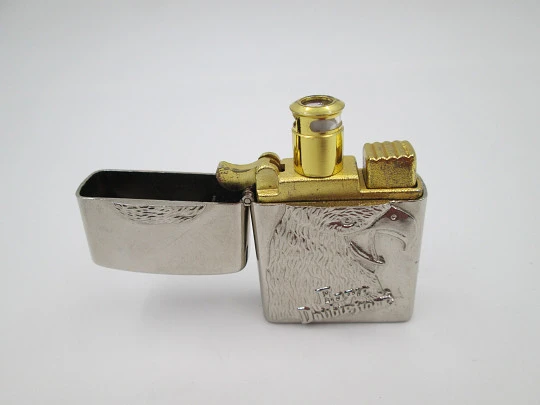 Eagle Double Flame butane torch pocket lighter with bird relief motif. Chromed plated