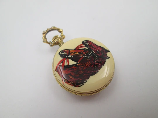 Exactus pendant watch. Gold plated metal. Manual wind. Horses enamel on back. 1960's