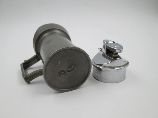 Figurative table gas lighter. Deciliter jug. Pewter and silver plated metal. Europe. 1960's