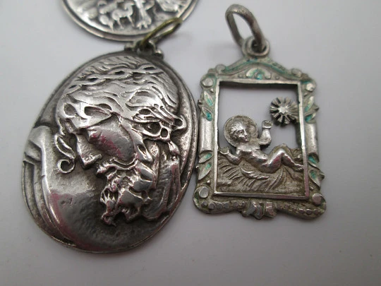 Five sterling silver religious medals collection. Jesus, virgins and saints. Spain. 1950's