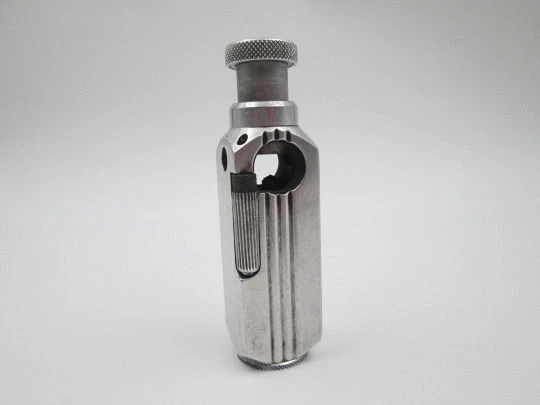 Flamidor Flambeau pocket petrol pipe lighter. Aluminum. Ribbed pattern. France. 1948