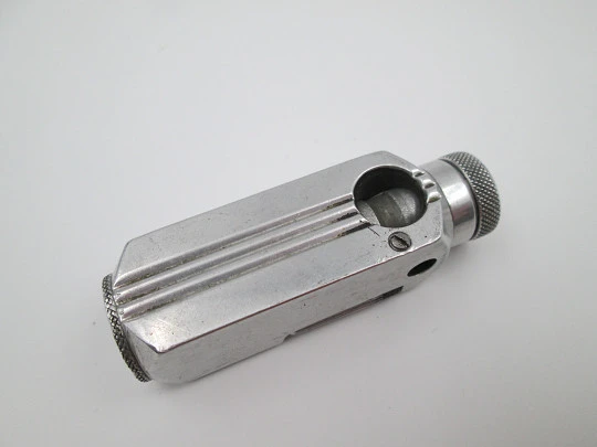 Flamidor Flambeau pocket petrol pipe lighter. Aluminum. Ribbed pattern. France. 1948