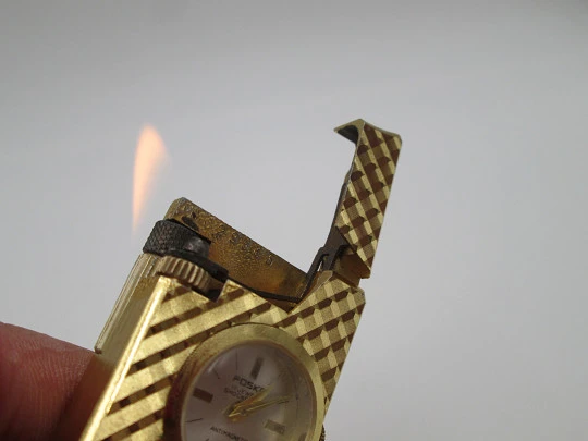 Foska butane lighter / mechanical watch. Gold plated. Rhomboid pattern. 1960's. Swiss