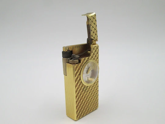 Foska butane lighter / mechanical watch. Gold plated. Rhomboid pattern. 1960's. Swiss