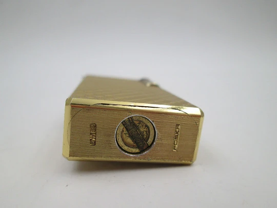 Foska butane lighter / mechanical watch. Gold plated. Rhomboid pattern. 1960's. Swiss