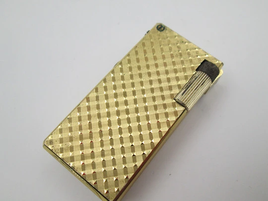 Foska butane lighter / mechanical watch. Gold plated. Rhomboid pattern. 1960's. Swiss