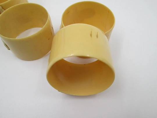 Four napkin rings set. Ivory celluloid. Modernist women's busts. Europe. 1940's