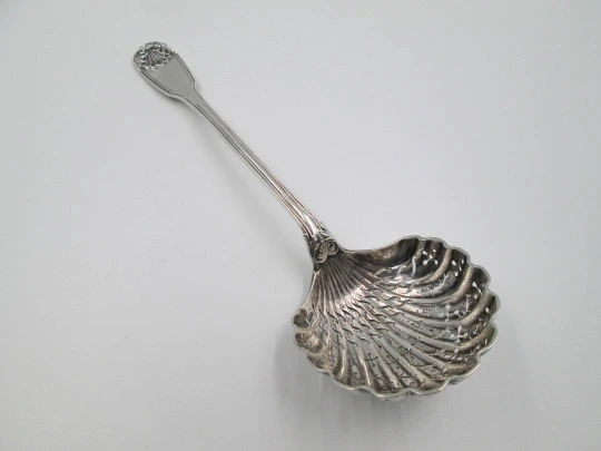 French sterling silver olive serving spoon. Ribbed motifs and shells. Openwork bowl