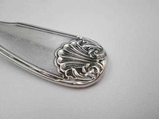 French sterling silver olive serving spoon. Ribbed motifs and shells. Openwork bowl