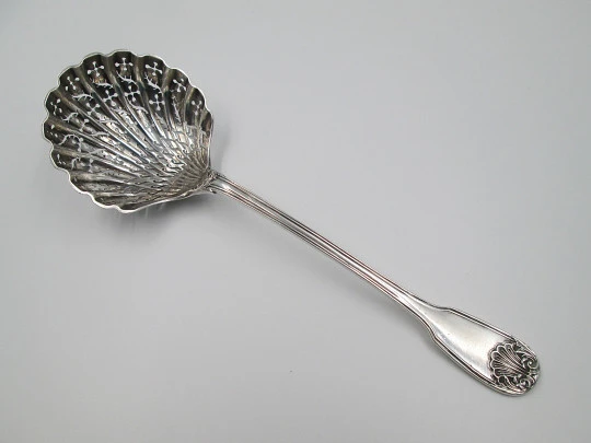 French sterling silver olive serving spoon. Ribbed motifs and shells. Openwork bowl