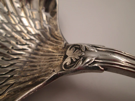 French sterling silver olive serving spoon. Ribbed motifs and shells. Openwork bowl