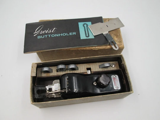 Greist rotary buttonholer machine. Lacquer and silver metal. Box and instructions. 1950's