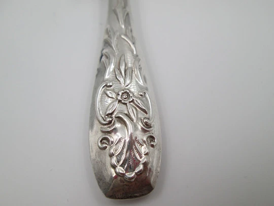 Hand baby rattle. 925 sterling silver. Floral and vegetable motifs. Ring on handle. Spain. 1990's