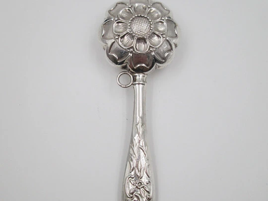 Hand baby rattle. 925 sterling silver. Floral and vegetable motifs. Ring on handle. Spain. 1990's