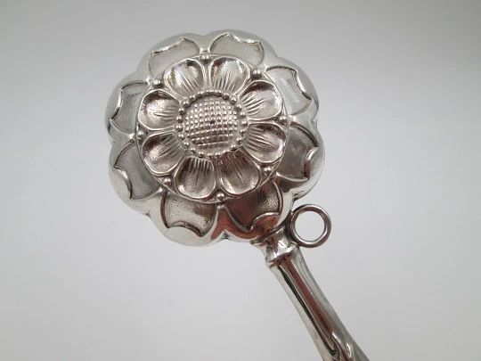 Hand baby rattle. 925 sterling silver. Floral and vegetable motifs. Ring on handle. Spain. 1990's