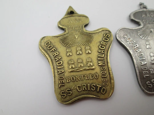 Holy Christ of Miracles Brotherhood (Bonillo) medals. Bronze and silver plated metal. 1900