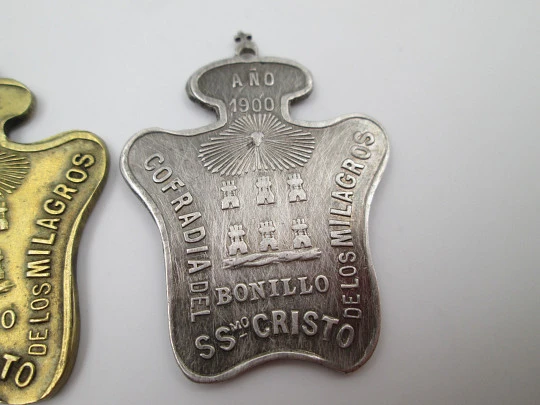 Holy Christ of Miracles Brotherhood (Bonillo) medals. Bronze and silver plated metal. 1900