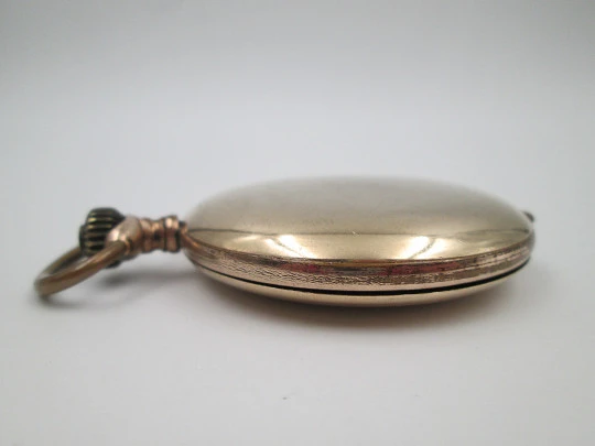 Hunter-case pocket watch. Gold plated metal. Stem winding. Porcelain dial. 1940's. Swiss