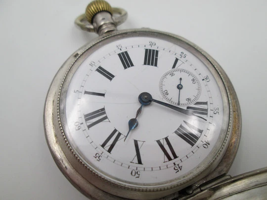 Hunter-case pocket watch. Sterling silver. Ornate lids. Stem-wind / pin-set. Swiss. 1900's