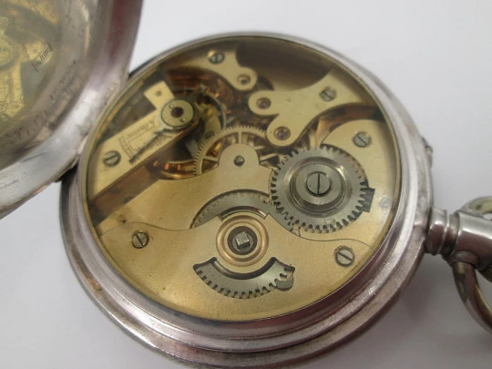 Hunter-case pocket watch. Sterling silver. Ornate lids. Stem-wind / pin-set. Swiss. 1900's